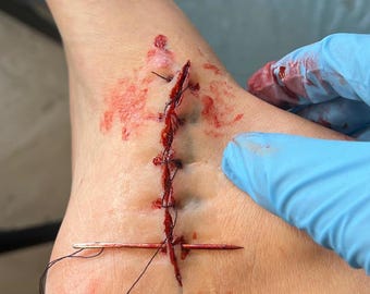 Realistic Silicone Stitched Wound – Handmade SFX Prosthetic for Halloween, Cosplay & Horror Makeup