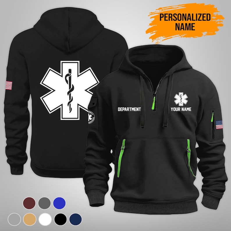 Puede incluir: Sudadera con capucha negra con un emblema blanco de la Estrella de la Vida y un dise&ntilde;o de serpiente en la parte delantera y trasera. La parte delantera tiene el texto "DEPARTMENT" y "YOUR NAME". Cuenta con cremalleras verdes y un parche de la bandera estadounidense en la manga.