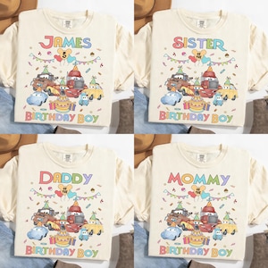 Puede incluir: Cuatro camisetas color crema con diferentes textos y gr&aacute;ficos. Una dice "JAMES" con un "5" y "BIRTHDAY BOY". Otra dice "SISTER OF THE BIRTHDAY BOY". La tercera dice "DADDY OF THE BIRTHDAY BOY". La &uacute;ltima dice "MOMMY OF THE BIRTHDAY BOY".