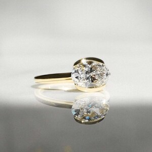 East West Vintage Oval Cut Moissanite Engagement Ring with Bezel Setting, 14k Yellow Gold Solitaire Diamond Half Bezel Set Ring Plain Band