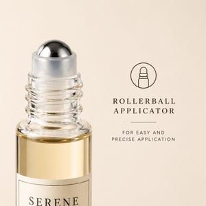 May include: A clear glass rollerball applicator bottle with a silver cap, filled with a light amber liquid. The text "ROLLERBALL APPLICATOR" and "FOR EASY AND PRECISE APPLICATION" are visible.
