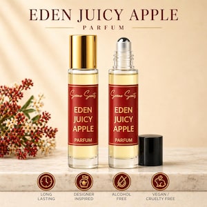 May include: Two perfume bottles labelled "Eden Juicy Apple Parfum" with gold and silver caps. The bottles are on a marble surface with text that says "Long Lasting", "Designer Inspired", "Alcohol Free", and "Vegan / Cruelty Free".