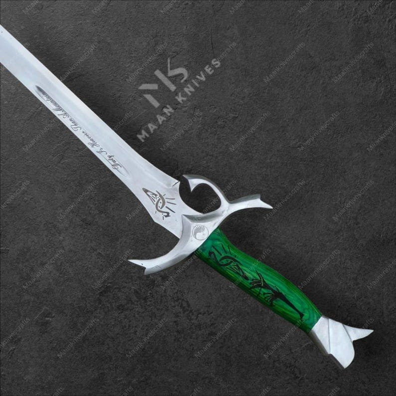 May include: A silver sword with a green handle. The blade has etched designs and text. The handle is a vibrant green with carved details. The sword's guard has a unique, stylized shape. The overall design suggests a fantasy or historical theme.