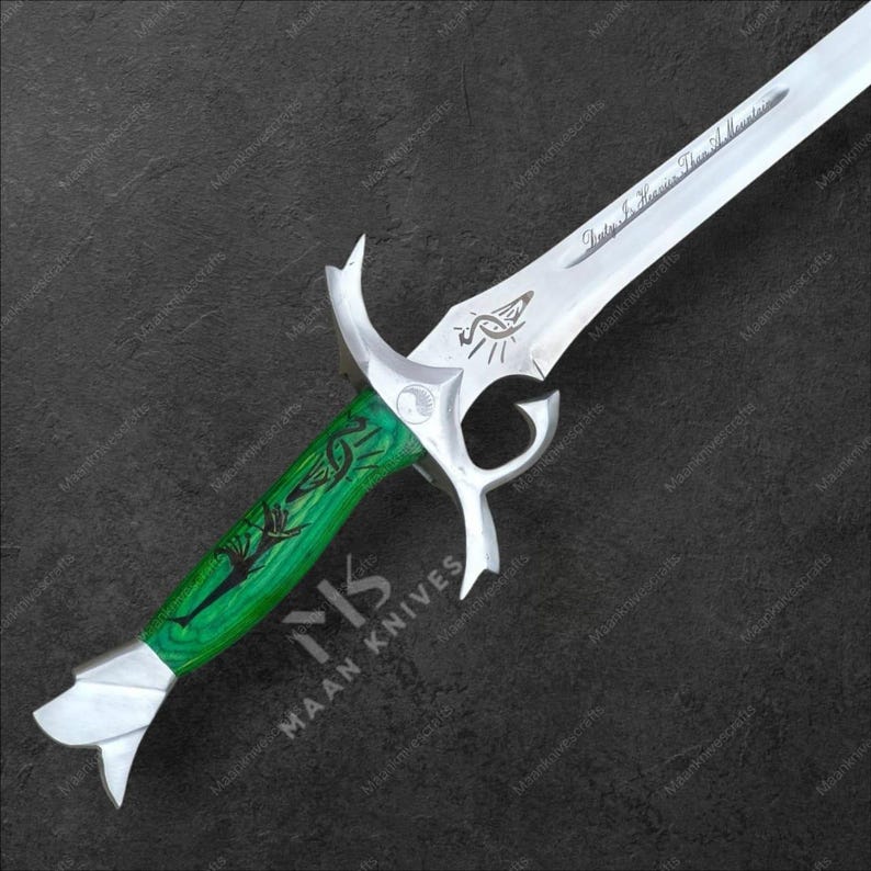 May include: A decorative sword with a silver blade and a green handle. The blade has an engraved design and the text "Duty Is Heavier Than A Mountain". The handle is green with a black design and the text "MAAN KNIVES".