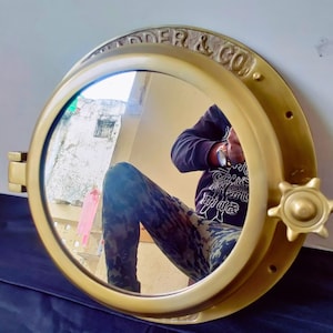 Nautical Porthole Mirror – Raw Brass Wall Décor mirror use in home