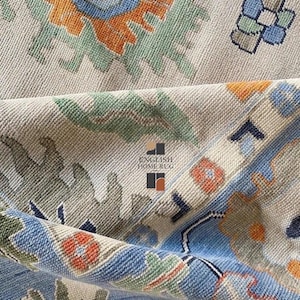 Hand-Knotted Oushak Wool Rug: Muted Colors, Vintage Turkish Design