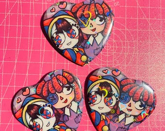TADC Jesterdoll | Ragatha x Pomni | Heart Holographic Button/Badge 2.24” inches