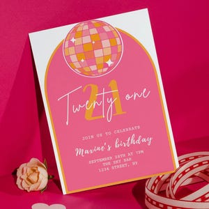 May include: A pink birthday invitation with a disco ball design. The invitation says "Twenty one" in a script font, with event details below. A rose and ribbon are in the foreground.