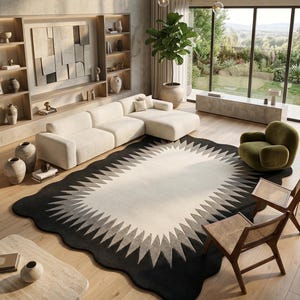 May include: A contemporary living room with a cream-coloured sectional sofa, a patterned rug with a black, grey, and white design, and a green armchair. The room has large windows overlooking a lush outdoor landscape, and wooden chairs.