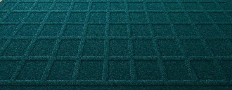 Modern geometric wool rug in deep teal with a textured grid pattern, styled in a luxurious, well-lit room with large arched windows, soft curtains, and polished wooden floors.