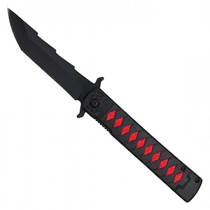 May include: A black knife with a serrated blade and a handle featuring red diamond-shaped accents. The handle has a decorative floral design near the blade. The knife is set against a white background.