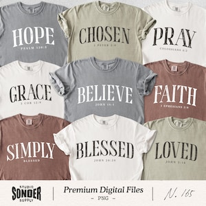 May include: A collection of t-shirts in various colors, each displaying a different word in bold, white lettering. The words include "HOPE," "CHOSEN," "PRAY," "GRACE," "BELIEVE," "FAITH," "SIMPLY," "BLESSED," and "LOVED," along with corresponding Bible verses.