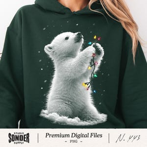 May include: A white ceramic mug with a black handle and the text "But First, Coffee" in a black, bold font. The mug is on a white surface. The mug is approximately 10 cm tall.