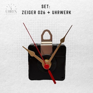 Könnte beinhalten: Ein Uhrwerk-Set mit dem Text "SET: ZEIGER 026 + UHRWERK". Das Uhrwerk ist schwarz mit goldfarbenen Zeigern und einem roten Sekundenzeiger. Die Zeiger der Uhr zeigen auf 10:09.