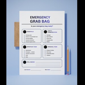 May include: A white paper checklist titled EMERGENCY GRAB BAG with sections for Essentials, Light & Communication, Important Items, Personal Items, and Still Needed. The document includes checkboxes and lines for dates, accompanied by a yellow pencil.