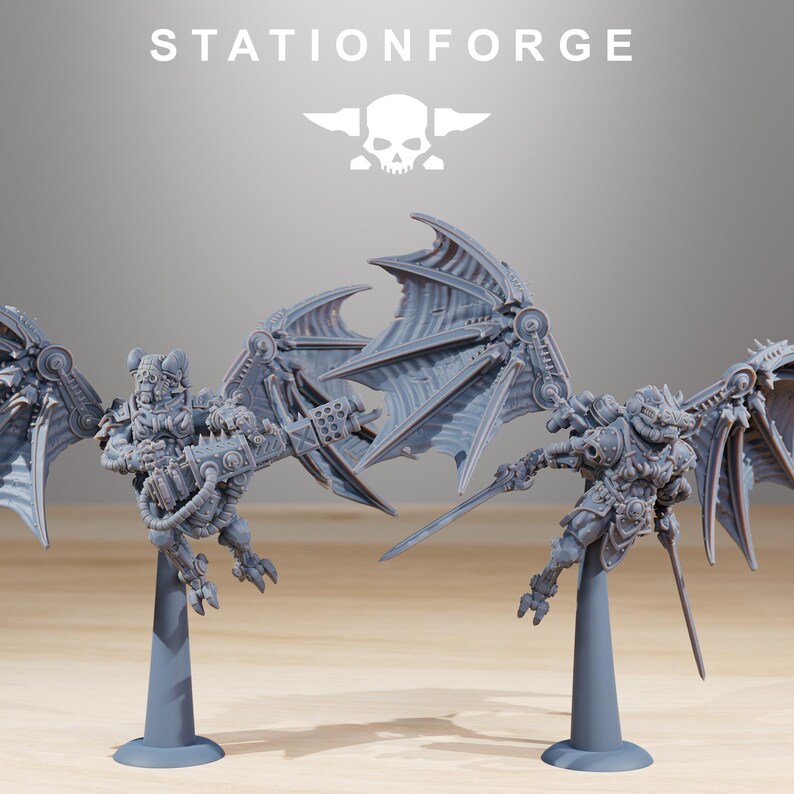 May include: Grey miniature figures with mechanical wings and weaponry, mounted on grey stands. The figures have detailed armour and are posed in action. The text "STATIONFORGE" and a skull logo are at the top.