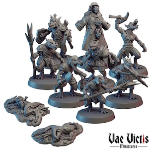 Puede incluir: Colección de figuras de fantasía en miniatura grises, que incluyen humanoides reptilianos en varias poses, algunos armados con armas y armaduras. Las figuras están sobre bases redondas, con un logo "Vae Victis - Miniatures."