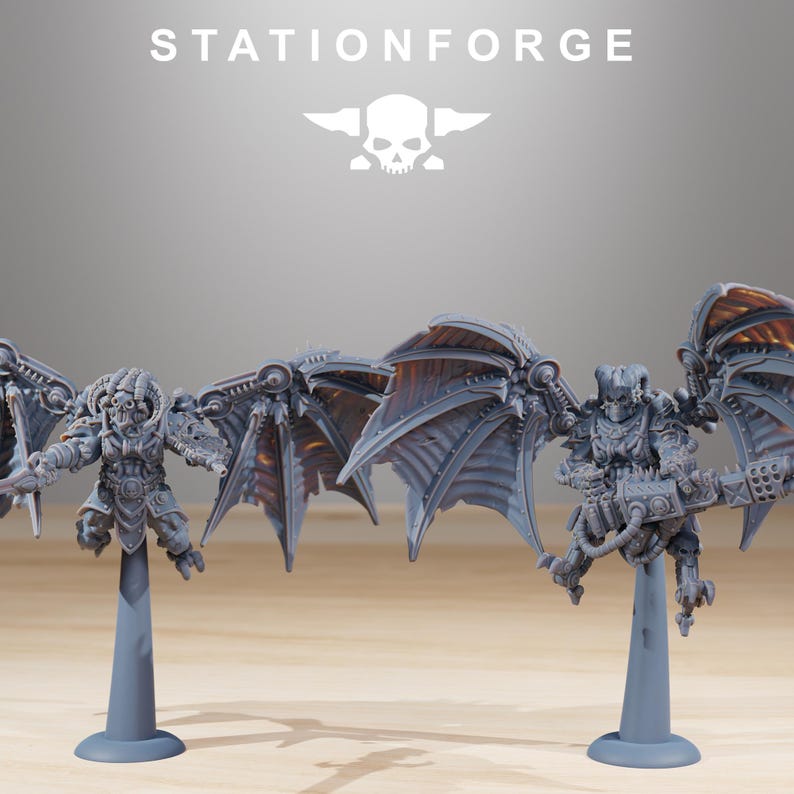May include: Multiple grey miniature figures with detailed wings and weaponry are displayed. The figures are mounted on grey stands, and the wings have a metallic appearance with orange and gold accents. The word "STATIONFORGE" is printed at the top.