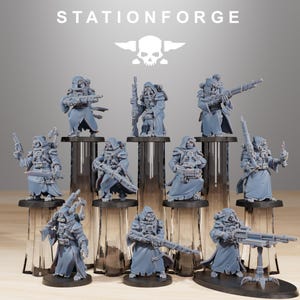 May include: A collection of gray miniature figurines, each depicting a character in a hooded coat and equipped with various weapons. The figures are arranged on clear stands, with the "STATIONFORGE" logo and a skull emblem visible at the top.