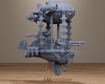 Op de afbeelding: Grijs model van een steampunk luchtschip met propellers, kanonnen en een schedellogo. Het luchtschip is gemonteerd op een transparante standaard met een zwarte basis. De tekst "STATIONFORGE LEGACY" staat bovenaan.