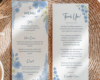 Puede incluir: Dos tarjetas de menú de boda y una tarjeta de agradecimiento con un diseño floral. La tarjeta de menú presenta una lista de platos, incluyendo bruschetta y risotto. La tarjeta de agradecimiento tiene un mensaje de gratitud.