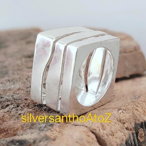 Fyrkantig signetring i sterlingsilver: Tjockt armband i statement-stil