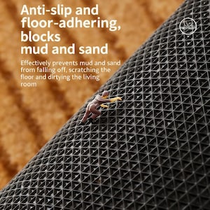 May include: A close-up of a black, anti-slip mat with a geometric pattern. The mat is designed to block mud and sand, with text that reads "Anti-slip and floor-adhering, blocks mud and sand". A small figurine is climbing the mat.