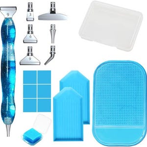 May include: A diamond painting kit with various tools. Includes a blue and silver pen, multiple applicator tips, blue trays, a white tray, a blue silicone pad, and blue wax squares. The kit is designed for crafting and art projects.
