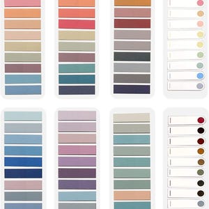 May include: A selection of colourful sticky note pads in shades of pink, orange, red, green, blue, and purple. Each pad contains multiple rectangular sticky notes, ideal for jotting down notes and reminders. Some pads have a lined design.