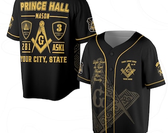 May include: Black baseball jersey with gold accents and text. The jersey features the words "PRINCE HALL" and "MASON" in gold, along with Masonic symbols and the text "YOUR CITY, STATE". The jersey has a button-up front and short sleeves.
