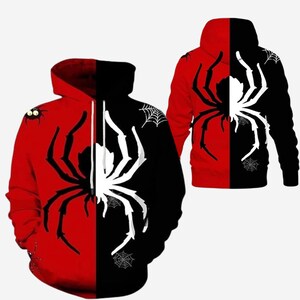 May include: Red and black hooded sweatshirt featuring a large spider design. The design is split vertically, with a red side and a black side. The spider is white, and spiderwebs are also present. The sweatshirt has a hood and a front pocket.