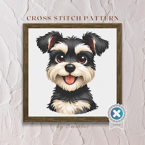 Peut inclure: Motif de point de croix d'un chien Schnauzer souriant avec une fourrure noire, blanche et beige, encadré dans un cadre en bois marron. Le texte "CROSS STITCH PATTERN" est en haut, avec "by Smetlos" en bas. Un badge "TESTED" est en bas à droite.