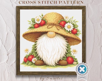 May include: A framed cross stitch pattern featuring a whimsical gnome wearing a straw hat adorned with red berries and white daisies. The gnome has a long white beard and is surrounded by greenery. The text "CROSS STITCH PATTERN" is at the top.