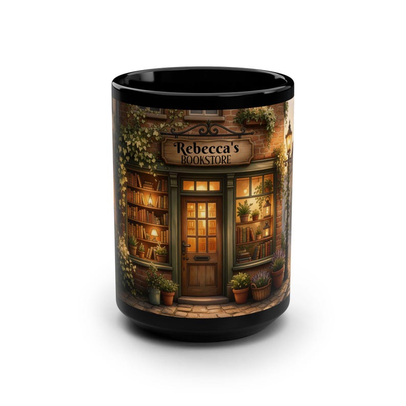May include: Black coffee mug with a detailed illustration of "Rebecca's Bookstore." The design depicts a cosy bookstore facade with a wooden door, bookshelves, and potted plants. The shop is surrounded by brick and climbing vines.