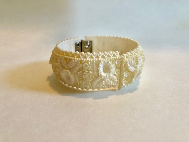 Small Creamy White Hinged Cuff Bracelet with Orchid Pattern Celluloid
