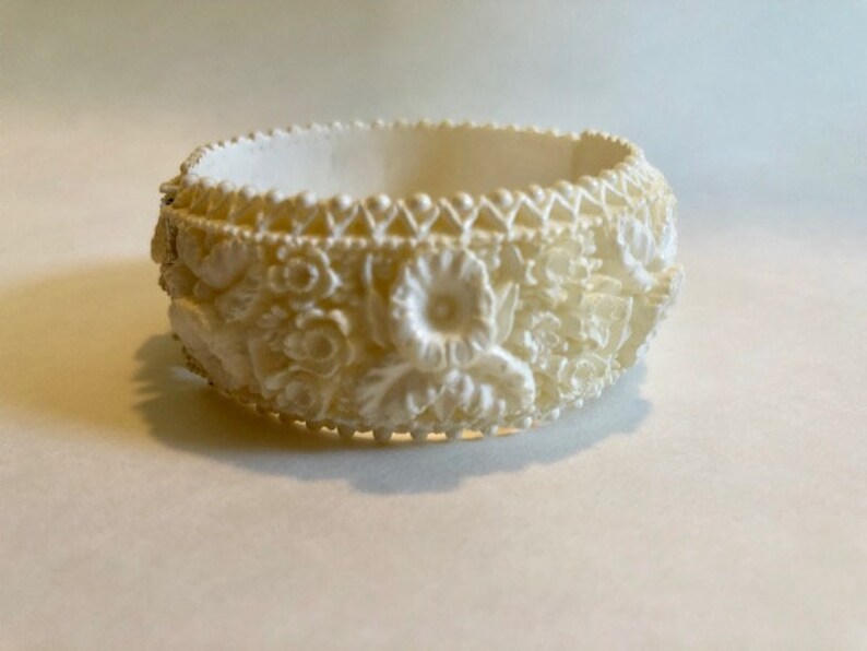 Small Creamy White Hinged Cuff Bracelet with Orchid Pattern Celluloid