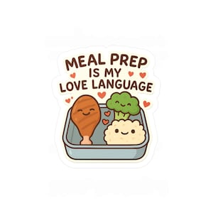 May include: A sticker featuring the phrase "MEAL PREP IS MY LOVE LANGUAGE" above a cartoon meal prep container. The container shows a smiling chicken drumstick, broccoli, and rice, with hearts scattered around.