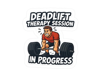 May include: A sticker featuring a cartoon illustration of a person deadlifting. The person is wearing a red shirt and black shorts, straining to lift a barbell with large black weights. Text reads "DEADLIFT THERAPY SESSION IN PROGRESS."