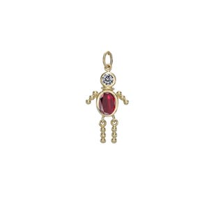 Peut inclure: Pendentif doré en forme de bonhomme. La tête est une pierre précieuse ronde et transparente, le corps est une pierre précieuse ovale rouge, et les bras et les jambes sont de petites perles dorées. Le pendentif est un bijou.