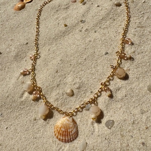 Handmade charm necklace made from natural seashells