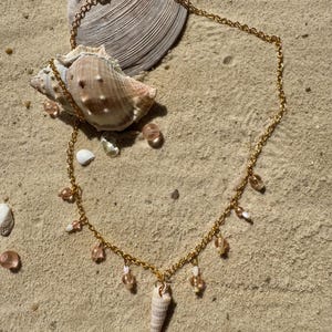 Handmade charm necklace made from natural seashells