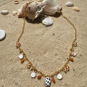 Handmade charm necklace made from natural seashells