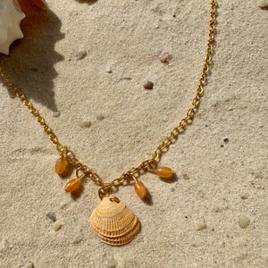 Handmade charm necklace made from natural seashells