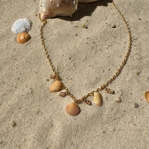 Handmade charm necklace made from natural seashells