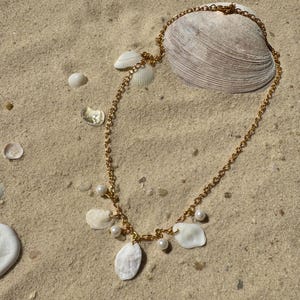 Handmade charm necklace made from natural seashells