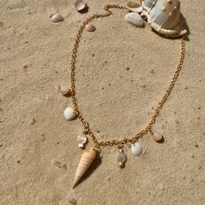 Handmade charm necklace made from natural seashells