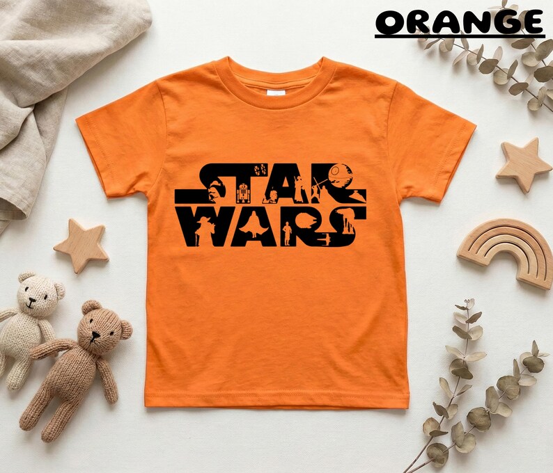 May include: A white ceramic mug with a black handle and the text "But First, Coffee" in a black, bold font. The mug is sitting on a wooden surface.