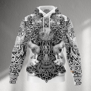 May include: A black and white hoodie featuring a detailed Viking design. The graphic includes intricate knotwork, animal figures, and a central wolf motif. The hoodie has a drawstring hood and long sleeves.