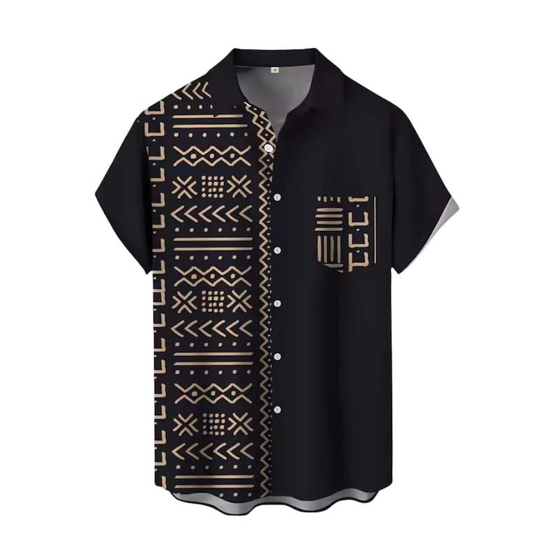 May include: Black short-sleeved shirt with a button-down front and a collared neckline. The left side features a beige and black geometric pattern, while the right side is solid black with a pocket. The shirt is made of a lightweight fabric.