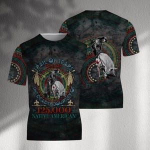May include: A dark green t-shirt featuring a Native American design with the text "TRAIL OF TEARS 1828-1838" and "THE DEADLY JOURNEY OF 125,000 NATIVE AMERICAN". The shirt has a crew neck and short sleeves.